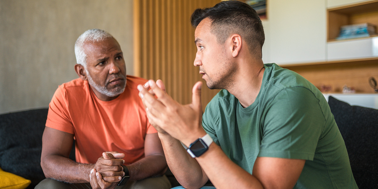 A guy talking to his friend